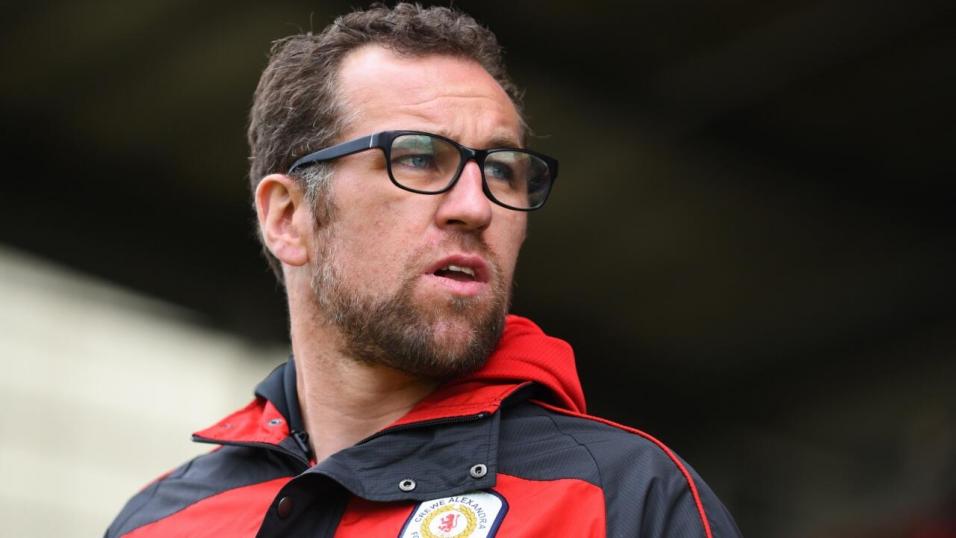 Crewe manager David Artell looking at the pitch